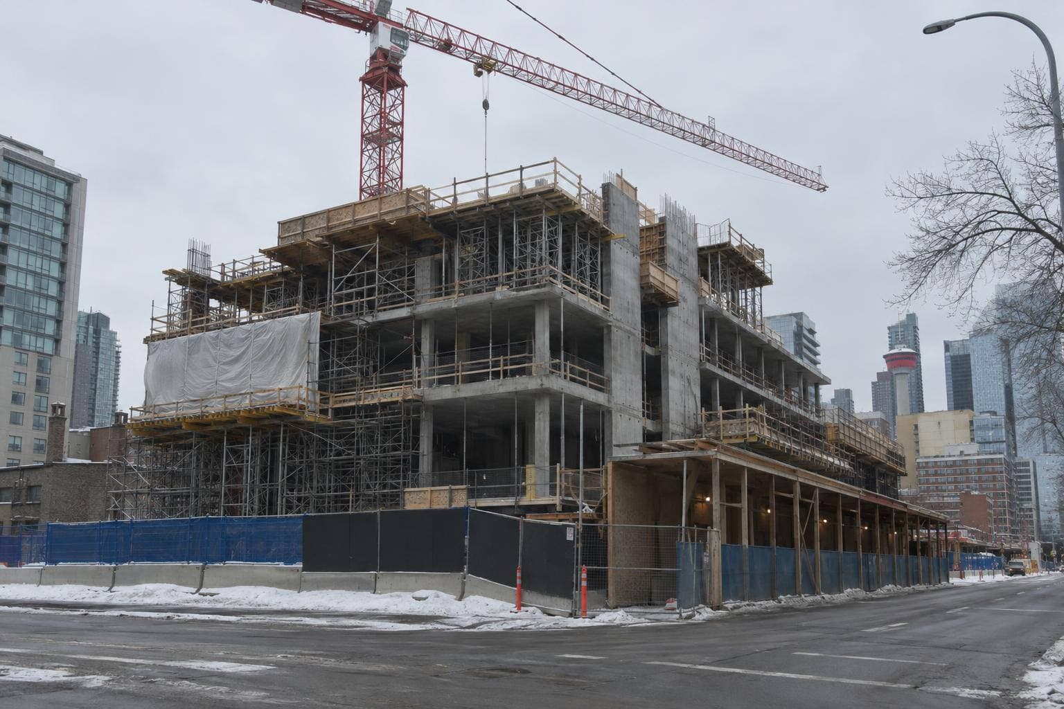 A Calgary commercial construction site — a general illustration for: Hot Mix Asphalt and Cement Concrete – Cold Weather Protocol